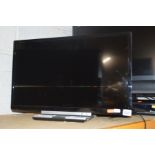 A TOSHIBA 24'' LCD TV (one remote)