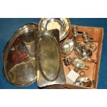 A BOX OF SILVER PLATE, to include a pair of candlesticks, a crumb tray, three piece tea service,
