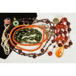 A SELECTION OF COSTUME JEWELLERY, to include a long orange bead necklace suspending a dragonfly