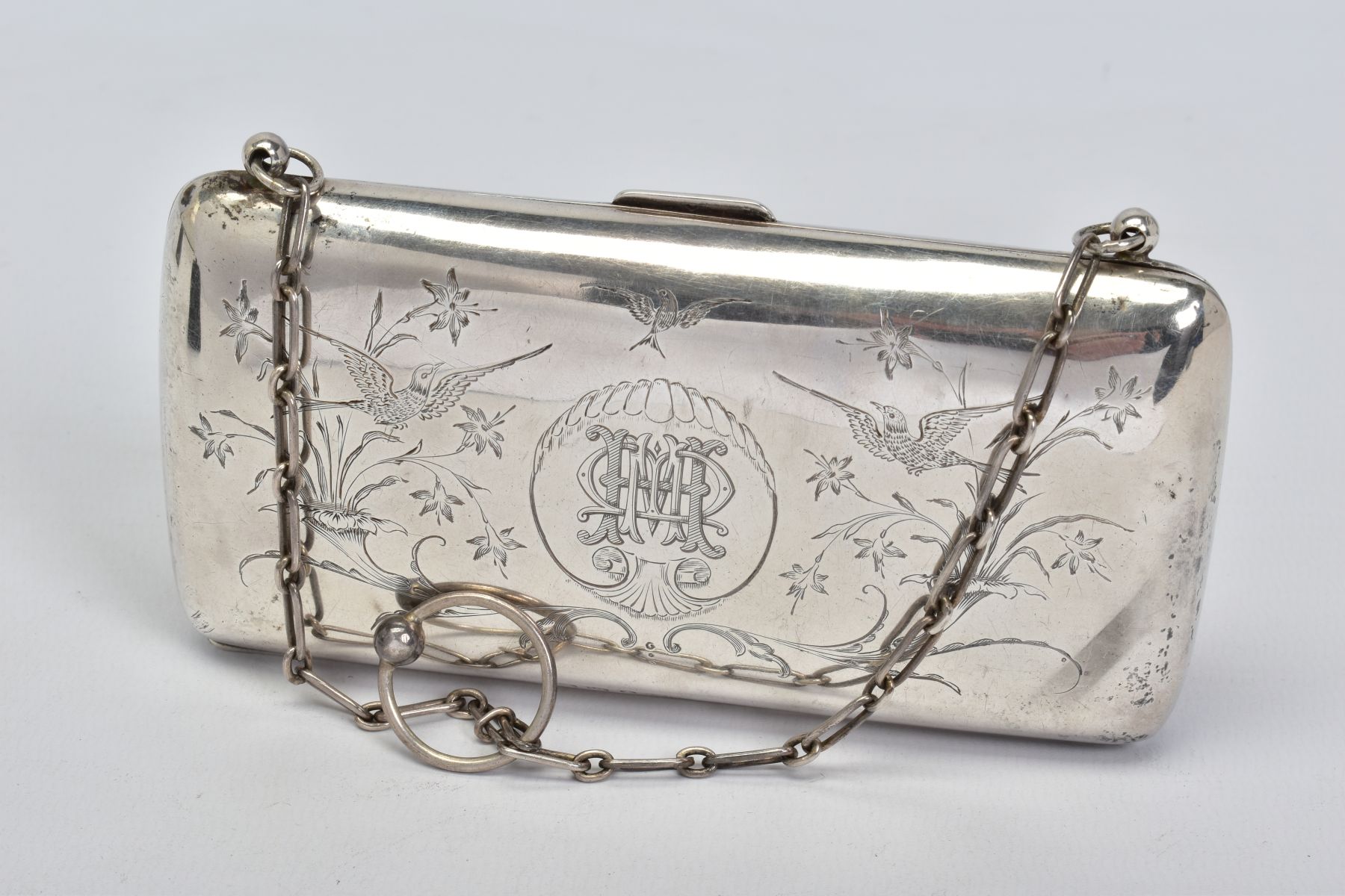 A GEORGE V SILVER PURSE, engraved with birds and foliate motifs, monogram engraved to the cartouche,