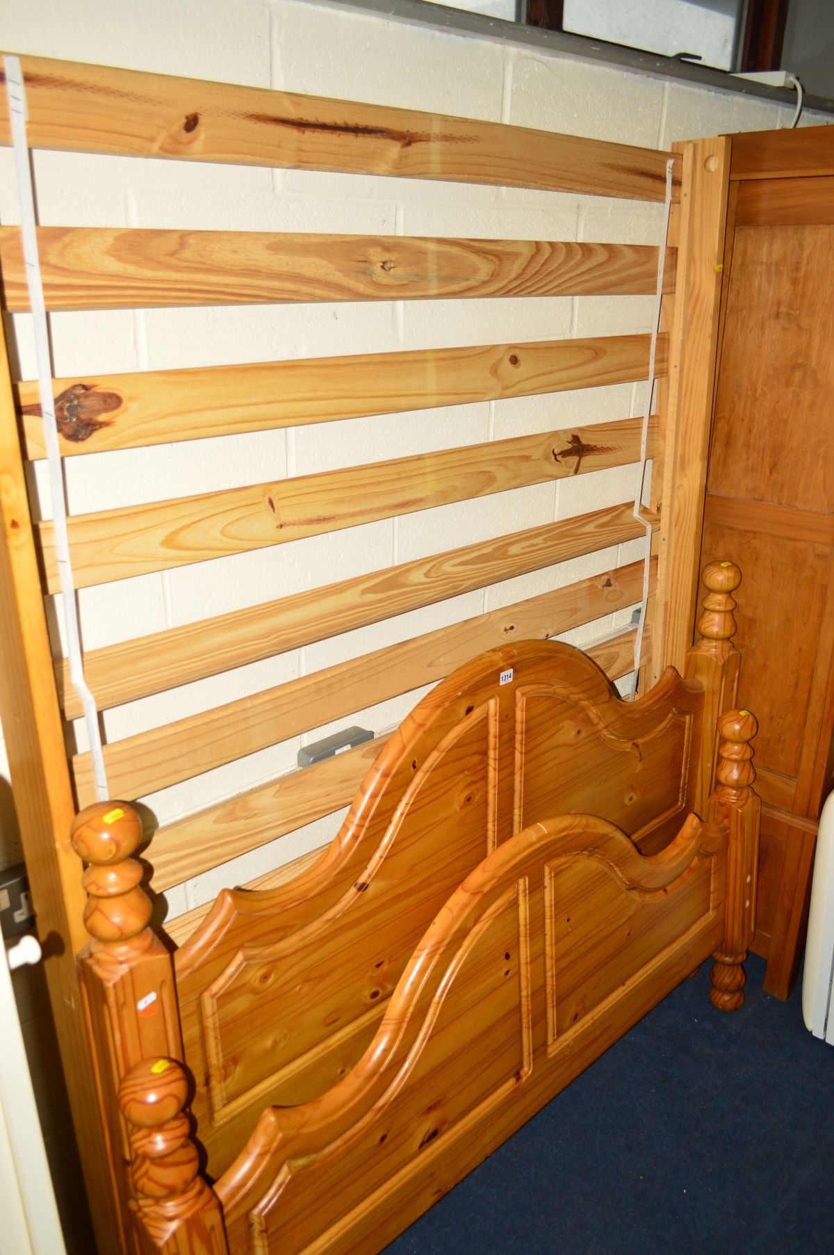 A PINE 4''6' BED FRAME