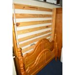 A PINE 4''6' BED FRAME
