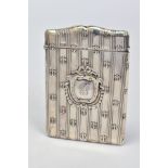 AN EDWRDIAN SILVER CARD CASE OF RECTANGULAR FORM, serpentine top, embossed stripe and fleur de lys