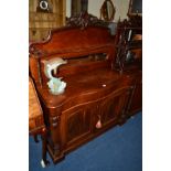 A VICTORIAN FLAME MAHOGANY SERPENTINE CHIFFONIER, the raised back with a single shelf, supported