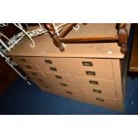 AN EARLY 20TH CENTURY PAINTED PINE BANK OF FIFTEEN DRAWERS with brass campaign handles, width