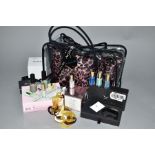A SELECTION OF MISCELLANEOUS ITEMS, to include a clear Revlon bag containing a further two