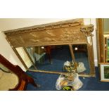 A DISTRESSED REGENCY GILT WOOD OVERMANTEL MIRROR, 134cm x 88cm (with some loose parts)