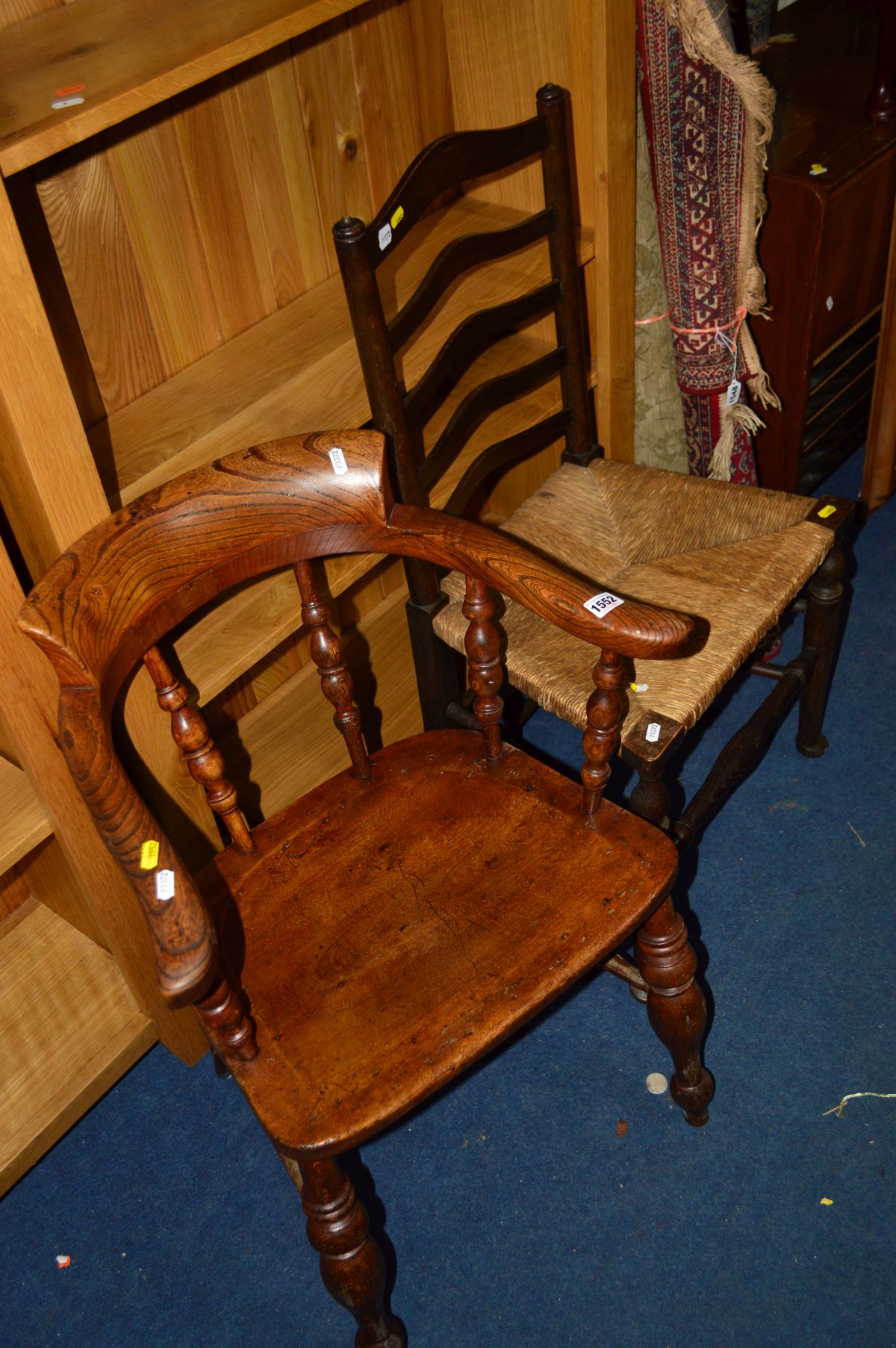 AN EARLY 20TH CENTURY AND LATER OAK AND MAHOGANY SMOKERS CHAIRS with turned spindles and a dish seat