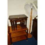 A MID 20TH CENTURY TEAK THREE TIER TEA TROLLEY together with an oak nest of three tables, beech