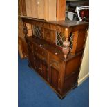 A MODERN OAK COURT CUPBOARD with two drawers, width 142cm x depth 49cm x height 138cm