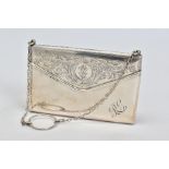 A GEORGE V SILVER ENVELOPE SHAPED CARD CASE, engraved decoration and initialled, lined interior,