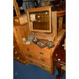 AN EDWARDIAN DRESSING CHEST OF THREE LONG DRAWERS with a later added rectangular swing mirror