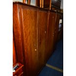 A STAG MINSTRAL FIVE PIECE BEDROOM SUITE, comprising of two sized double door wardrobes, largest