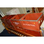 EIGHT RED GROUND STORAGE BOXES, with six boxes marked Kodapak