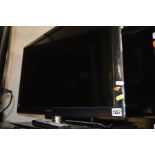 A SAMSUNG 32'' LED TV (remote)