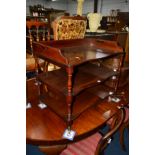 A LOW EARLY 19TH CENTURY MAHOGANY THREE TIER STAND, gallery top with twin carrying handles, turned