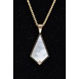 A 9CT GOLD MOTHER OF PEARL AND DIAMOND PENDANT NECKLACE, the kite shape mother of pearl pendant