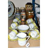 A CZECHOSLAVAKIA COFFEE SET, six cups, saucers, side plates, milk, and slop bowls (chip to the