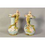 A PAIR OF ROYAL DUX ART NOUVEAU STYLE FIGURAL TWIN HANDLED VASES, depicting ladies on water