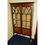 AN EDWARDIAN MAHOGANY ASTRAGAL GLAZED DOUBLE DOOR DISPLAY CABINET on cabriole legs, width 94cm x