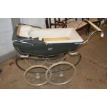 A VINTAGE SILVER CROSS PRAM