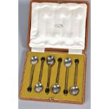 A CASED SET OF SIX GEORGE V SILVER BEAN END COFFEE SPOONS, maker C B & S, Sheffield 1916, gross
