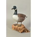 A CANADIAN GOOSE HARDWOOD SCULPTURE, on wooden stand, with plaque to base, total height 23cm