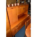 A TALL G PLAN TEAK SIDEBOARD with various assortment of cupboards and three drawers, width 100cm x