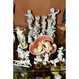 A GROUP OF CERAMIC FIGURES AND DISH, to include Ruddstadt Volkstedt cherub figure holding a conch