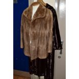 A MINK JACKET AND A FAUX FUR COAT, the light brown mink jacket with lapel collar with three hook