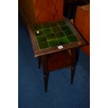 AN EDWARDIAN MAHOGANY GREEN TILE TOP OCCASIONAL TABLE in the manner of Shapland and Petter