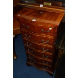 A TALL REPRODUCTION MAHOGANY SERPENTINE CHEST OF SIX DRAWERS, width 48cm x depth 40cm x height 99cm