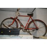 A RED ELSWICK GENTLEMANS BICYCLE together with a tray of bicycle parts (2)