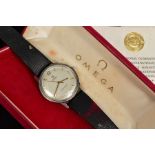 A CASED OMEGA SEAMASTER AUTOMATIC WRISTWATCH, gold coloured batons, quarterly Arabic numerals and