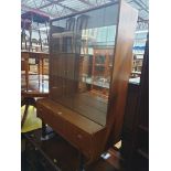 A TURNIDGE OF LONDON TEAK BOOKCASE with a mirrored back and double glazed doors above a single