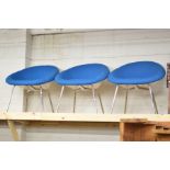 A SET OF THREE BLUE UPHOLSTERED AND PERSPEX TUB CHAIRS on chrome legs together with a pair of