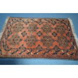 A 20TH CENTURY KUBA RUG, russet ground of a geometric design, 192cm x 132cm