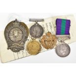 A BOX CONTAINING MEDALS AND BADGES TO MEMBERS OF THE SAME FAMILY, WW1 British war and victory medals