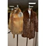 A LADIES FOX FUR JACKET, having feature silver fox shoulders, side hip pockets and internal
