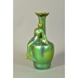 A ZSOLNAY GREEN LUSTRE FIGURAL VASE, shaped as maiden reclining on vase, black backstamp, height