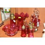 A GROUP OF CRANBERRY COLOURED GLASSWARES, to include pair small wall hanging baskets, cruet set,