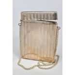 AN EDWARDIAN SILVER CARD CASE OF RECTANGULAR FORM, hinged top, engine turned decoration, vacant