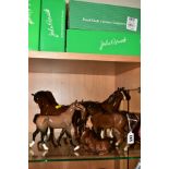 FIVE BROWN BESWICK HORSES, 'Stocky Jogging Mare' No855, 3rd version, Foal No915, Swish Tail Horse