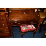 A GEORGIAN OAK FALL FRONT BUREAU with a fitted interior, single drawer on four square tapering legs,