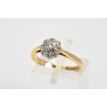 AN 18CT GOLD DIAMOND RING, designed as a tiered cluster set with nine single cut diamonds, estimated