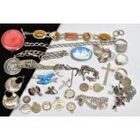 A SELECTION OF SILVER AND WHITE METAL JEWELLERY, to include an enamel swallow brooch, a gem panel