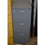 A THREE DRAWER METAL FILE CABINET (key)