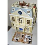 A SYLVANIAN FAMILIES GRAND HOTEL, missing plant pots and most furniture, has slight damage to one