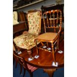 A LATE VICTORIAN WALNUT BUTTONED BACK CHAIR on ceramic casters together with a 20th Century mahogany