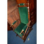 AN EDWARDIAN MAHOGANY AMERICAN ROCKING CHAIR together with gilt painted Lloyd Loom bedroom chair (